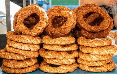 Traditional bagel turkish simit, sesame bread rings, street food closeup view