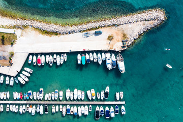 Aerial view of boats and ski jets in the sea. Boats and ski jets in the ocean. 