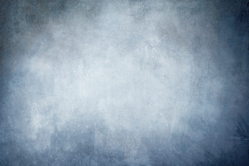 Obraz na płótnie Canvas grungy blue canvas background or texture