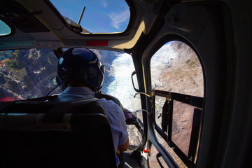 In a helicopter flying towards a glacier in Franz Josef New-Zealand © Marco