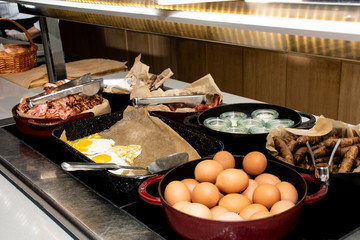 Selection of self service catering continental breakfast buffet display, catering brunch table food...