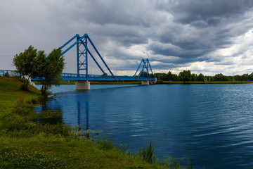 Picturesque pedestrian bridge across the river