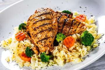 Grilled chicken fillets, rice and vegetables