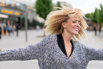 close-up portrait of Caucasian girl hipster afro hairstyle. Actively move and have fun. Be happy....