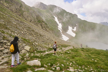 Fototapeta na wymiar Woman hiker with backpack