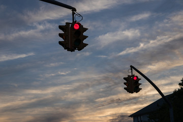 Traffic light with green light against the evening sky in USA.  Selective focus.