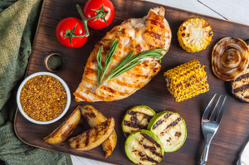 Fried chicken fillet and grilled vegetables