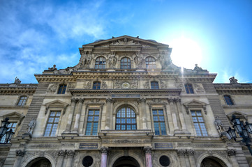 Paris, France - April 21, 2019 - A view of the Louvre Museum, the world's largest art museum and a historic monument in Paris, France, on a sunny day.