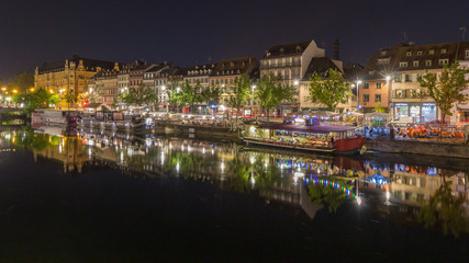 Reflexion in docks in Strasbourg by night
