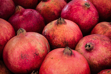 pomegranate, grenadine fruit - closeup of pomegranates -
