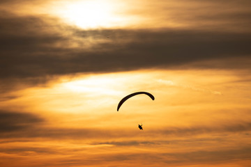 Sunset and paraglider