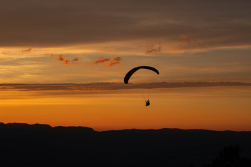 Sunset and paraglider