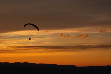 Sunset and paraglider
