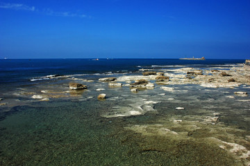 Rocky sea coast in Livorno, Italy