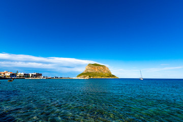 Fototapeta premium Protected ancient fortress on island rock Monemvasia, view from mainland, Peloponnese treasures, Greece
