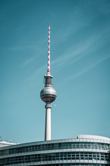 The TV tower of Berlin with the moon