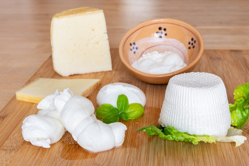 Traditional Apulian cheeses composition: pecorino, mozzarella, ricotta, burrata. Puglia, Italy