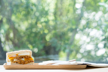 Sandwich with boiled egg and dried shredded pork