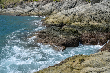 waves crashing on rocks