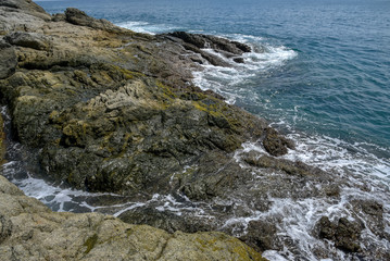 waves crashing on rocks