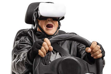 Excited mture man with a VR set driving a car