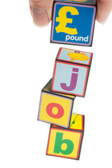 toy building blocks concept of money and jobs