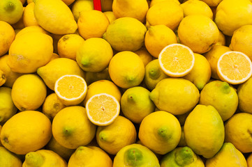 Ripe lemons on a market stall