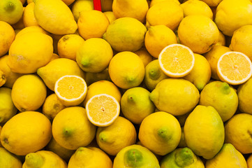 Ripe lemons on a market stall
