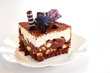 chocolate pastry sweet cake on a white plate. Homemade bakery, festive dessert