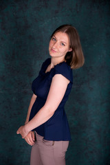 Fototapeta premium Portrait of Beautiful Young Woman in Studio