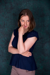 Fototapeta premium Portrait of Beautiful Young Woman in Studio