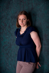 Naklejka premium Portrait of Beautiful Young Woman in Studio