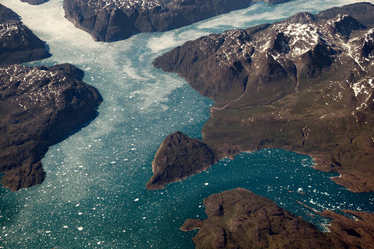 Aerial view of a few fjords in Southern Greenland. Taken from about 35,000 feet, we can see the incredible mass that is this area.