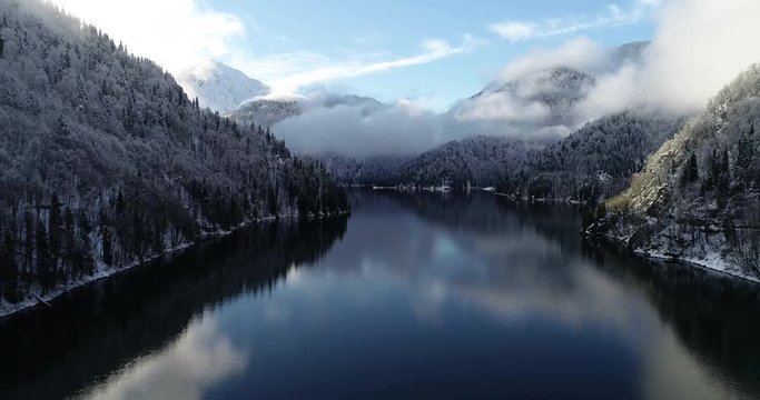 Lake Ritsa in the New Year holidays in January in the mountains of Abkhazia (Georgia) A series of unique source videos in 4K filmed by a professional drone from a winter trip 