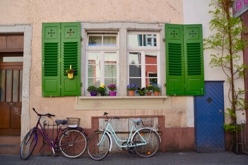 Fototapeta na wymiar Bicycles under a pretty window in Heidelberg Germany