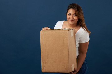 Young woman hold package box