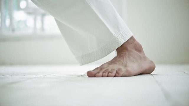 Foot of man in kimono