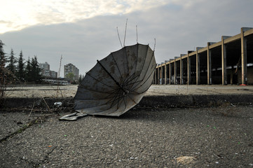 broken umbrella in abandoned factory in east europe