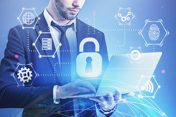 Man with laptop, cyber security