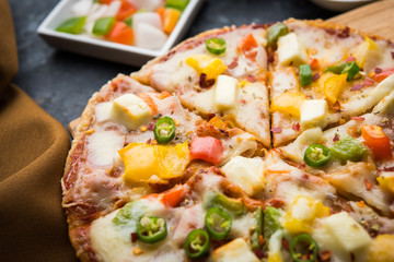 Chapati Pizza made using leftover Roti / Paratha with Cheese, vegetables, paneer and Sausage