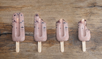 Top view peanut ice-cream on wood texture background.