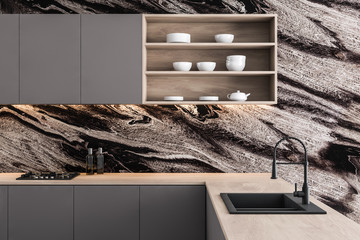 Side view of black marble kitchen counter