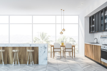 White marble and gray kitchen, bar and table