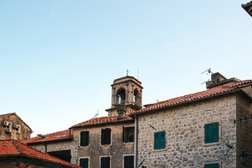 Fototapeta na wymiar Old historical buildings in the ancient town Kotor, Montenegro