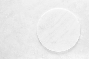 Empty stone board on white background with space for text, culinary background, top view