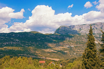 Mountain summer landscape. Montenegro, Dinaric Alps, view of Bjelopavlici plain near Ostrog monastery