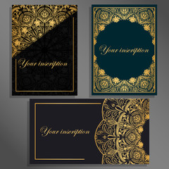 A set of cards, business cards, invitations on a black, gray and blue background with a picture of a mandala of gold color