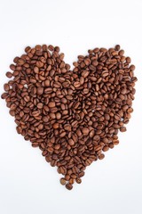 heart made of coffee beans isolated on white background