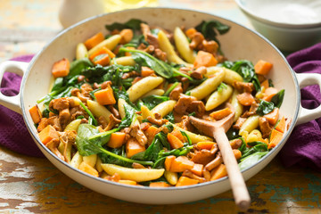 Potato dumplings with chanterelle, spinach & sweet potato
