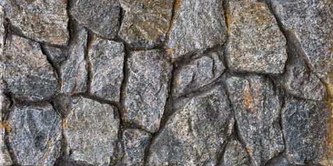 Old wall of natural stone. Abstract background